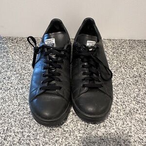 Men’s black RAF Simons x Adidas Stan Smith